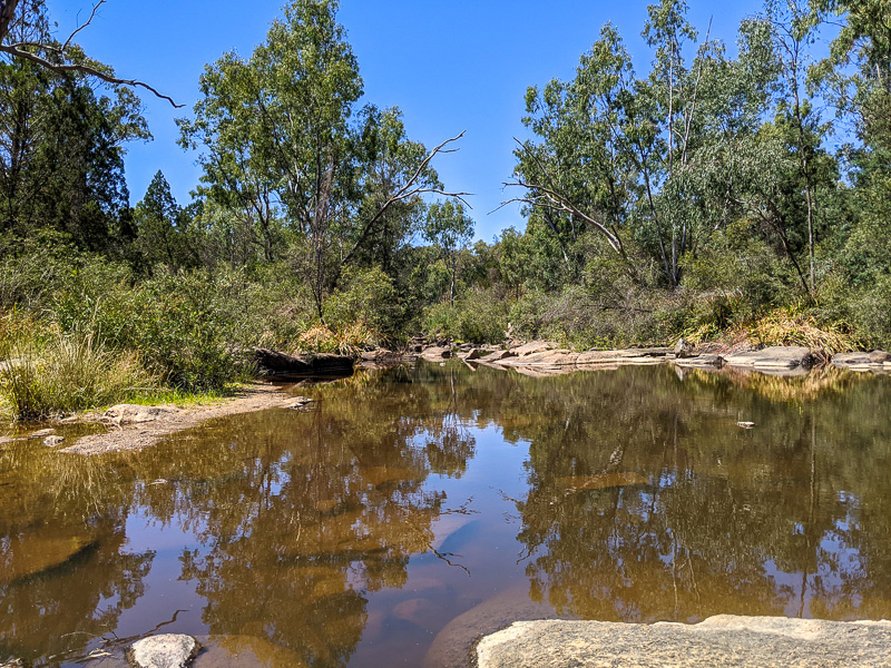  - After the gorge hike, I drove along gravel to a place called Eldorado. Hiding in the scrub along this creek were many people camping, panning for gold