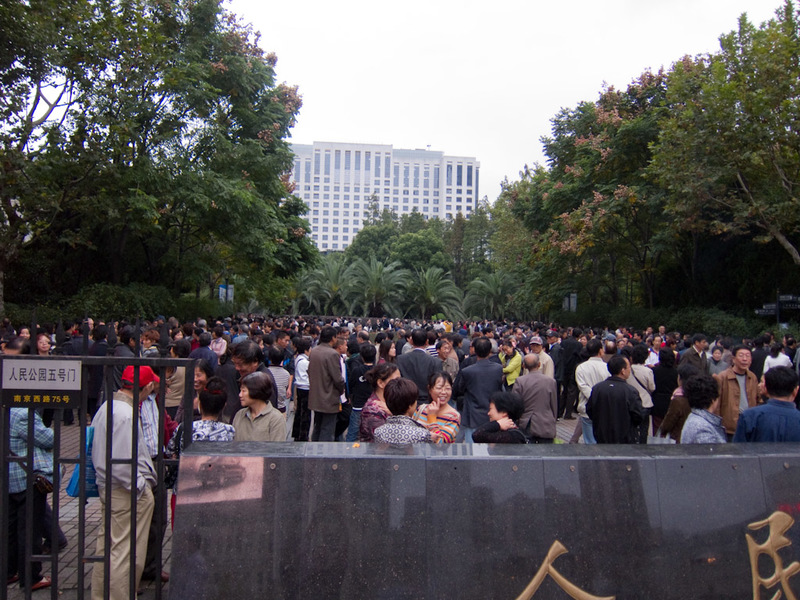 China November 2011 - From Shanghai to Beijing - I was taking this photo of an inexplicable huge crowd when the girls approached me to try the tea scam.