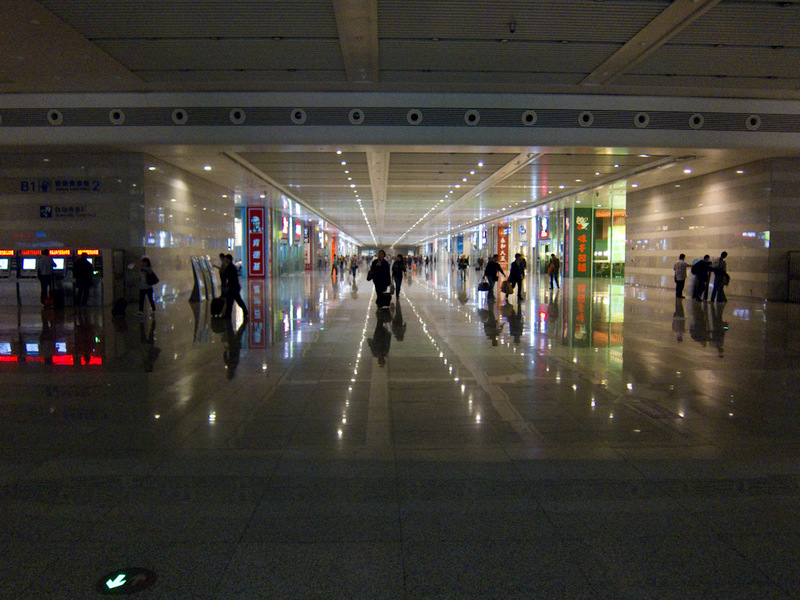 China November 2011 - From Shanghai to Beijing - One of the never ending hallways of Shanghai Hongqiao transport hub. My kind of place. I will go here at least 2 more times, tomorrow to go to Suzhou,