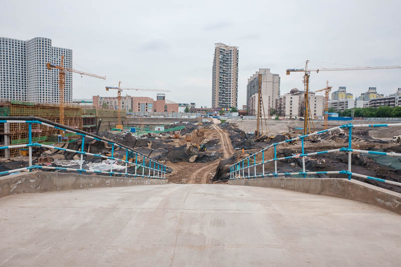 The great loop of China - April 2018 - A Chinese building site. They do not mess around. You could easily build 10 apartment towers here, and they probably are.