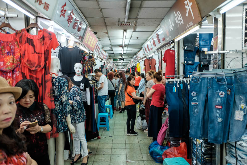 The great loop of China - April 2018 - Inside is a very claustrophobic wholesale clothes market. People still go here to buy things though, no change rooms, no matter, just get undressed in