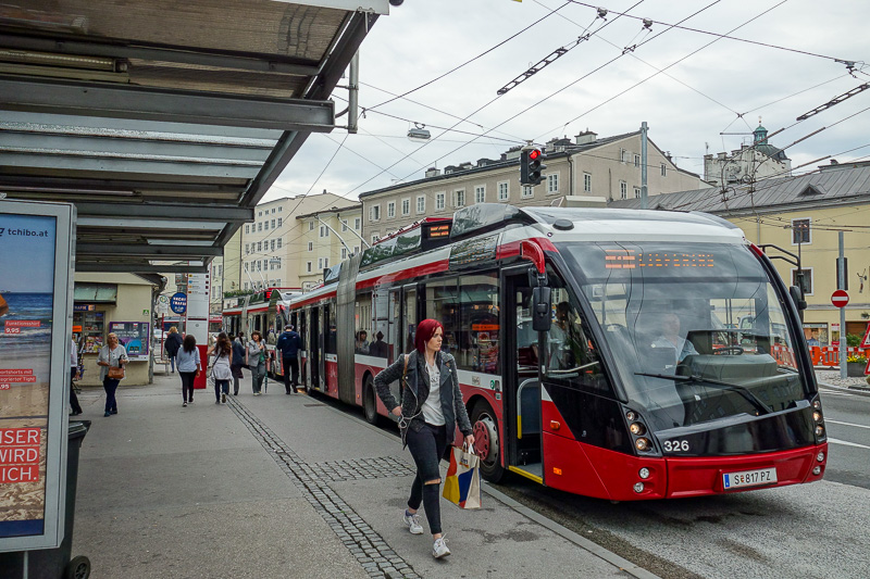 Austria-Salzburg-Mozart-Sausage - Salzburg has these electric buses. Look closely you can see two poles that stick up and hook onto wires. They are kind of like trams, except they can 