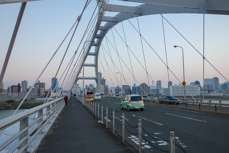 Japan-Osaka-Shinsaibashi-Den Den Town - Crossing the bridge from Shin Osaka. Surpisingly not cold. Hands not needed in pocket even. Speak good I do.