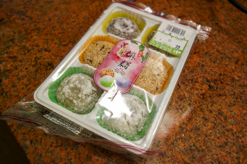 Hong Kong - Japan - Taiwan - March 2014 - Bonus photo due to lack of photos, my snack. Mochi from the Carrefour megamart. I dont like them much, never have, and these are mystery flavours, but