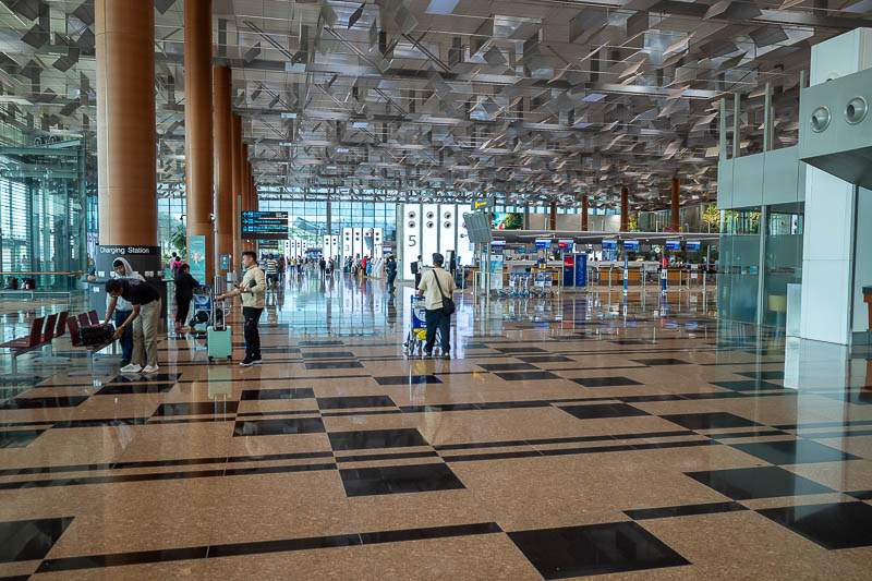 Singapore-Melbourne-Airport - Singapore departure gate area - you can check in anywhere! You do not go to a specific counter, if you are flying Singapore airlines, go to any counte