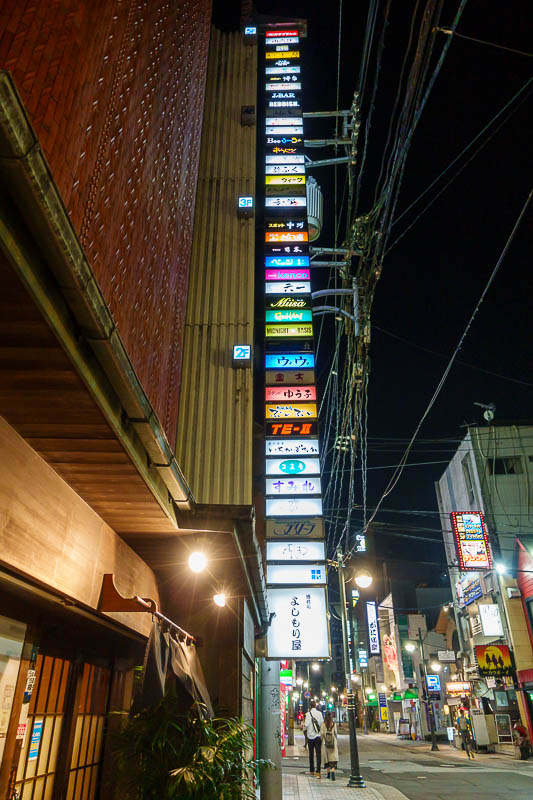 Japan-Hiroshima-Okonomiyaki - That is a lot of small bars inside one small building.