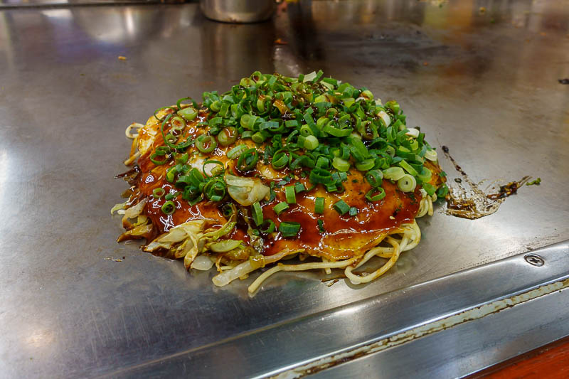 Japan-Hiroshima-Okonomiyaki - And there is my selection. I chose a slight variation which added kim chi so that it was 1000 yen exactly, because I did not want any coins. Also I li