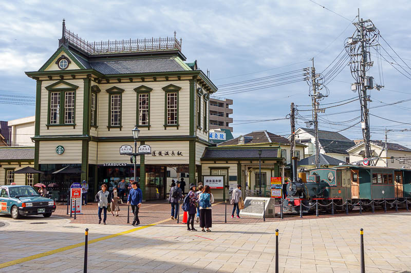 Japan-Matsuyama-Castle-Onsen - Here is the station, and an old train, just off to the right there was an Indian woman in full colourful sari filming a travel segment with a TV crew,