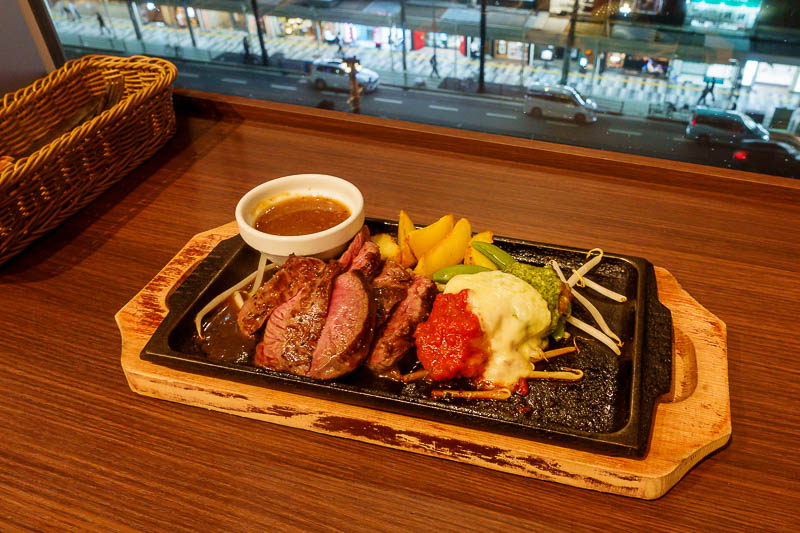 Japan for the 10th time (Finally!) - October and November 2023 - And so I ended up at a steak restaurant, and got the steak and chicken combo. The thing under the tricolore is a chicken thigh fillet. The steak was o
