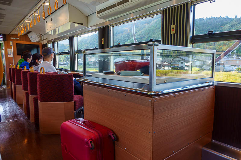 Japan for the 10th time (Finally!) - October and November 2023 - And what a train it was. Let me explain its features. First of all there is a display of handbags for sale in a glass cabinet. Seriously! But also, si