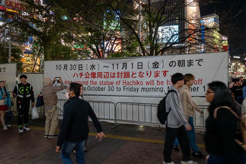 Japan-Tokyo-Shibuya-Halloween - Hachiko (small dog statue) was boarded up last year too. So now we all take a photo of the sign advising that you cannot see Hachiko. Next year - a si