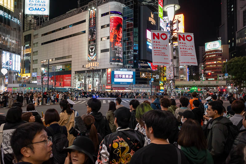 Japan-Tokyo-Shibuya-Halloween - Not nearly as many people as previous years, note the signs on the light poles.