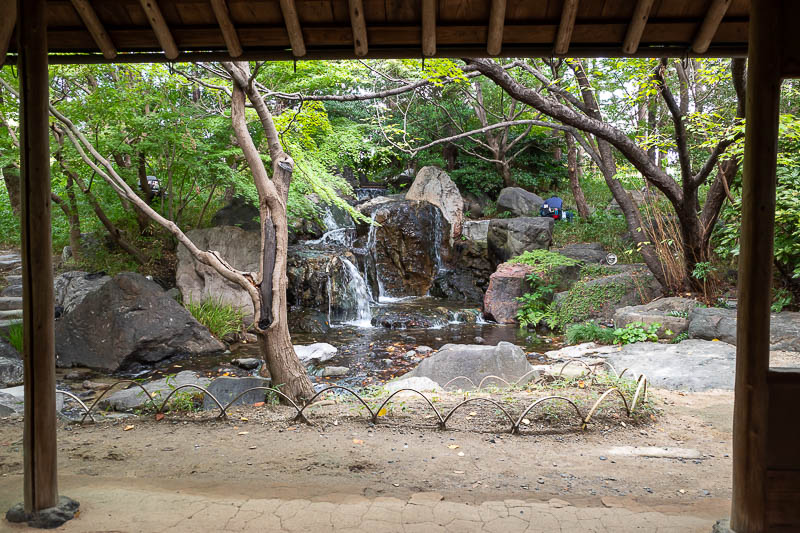 Back to Japan for the 11th time - October and November 2024 - Here is the mini fake waterfall. You can see one of the men in blue working suits attaching lights in this photo.