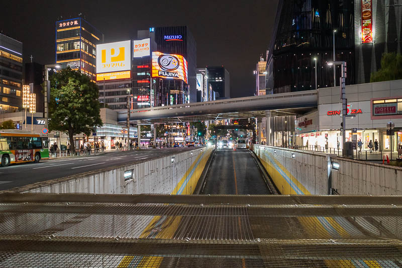 Japan-Tokyo-Shimbashi-Ramen - I found myself Ginza adjacent, standing in the middle of the road above a freeway tunnel. People looking through clear umbrellas were concerned for my