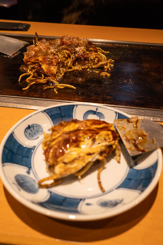 Back to Japan for the 11th time - October and November 2024 - Encased within is pork, prawns, squid, cabbage, pickled ginger, noodles, dried fish flakes and seaweed sprinkles on top of the sweet sauce. I do not a