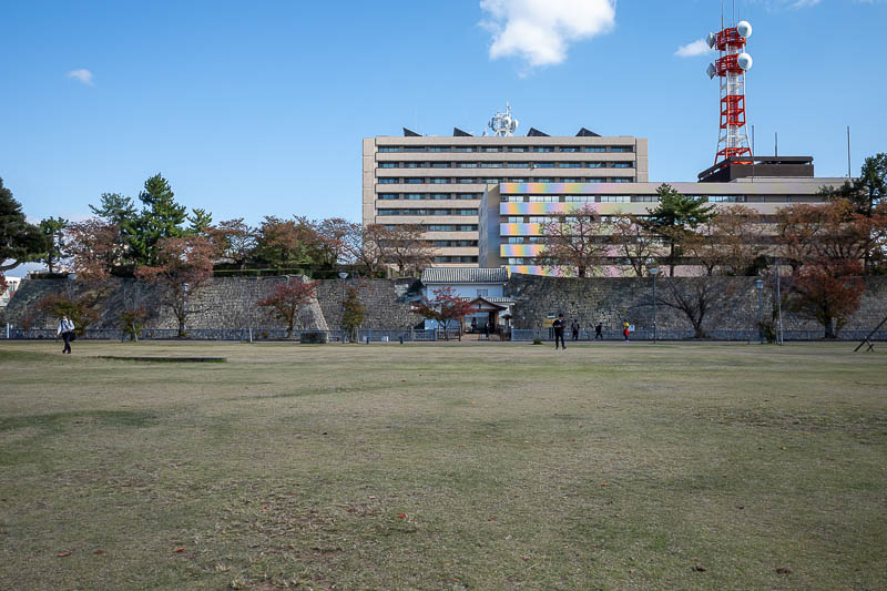 Back to Japan for the 11th time - October and November 2024 - First photo of Fukui, dead grass, castle walls and prefectural office.