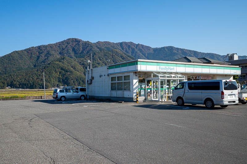 Back to Japan for the 11th time - October and November 2024 - A Family mart in the fields, it would be great if there were no cars parked around it. I bought my pocari sweat and muesli bars.