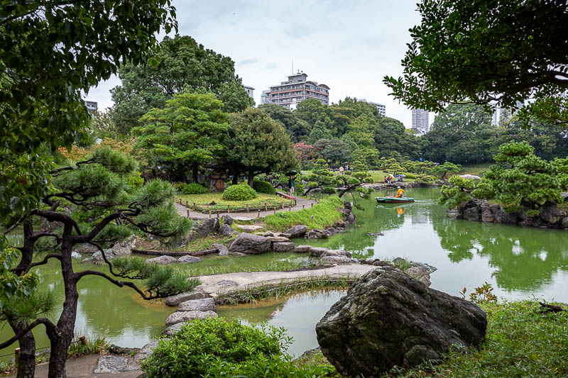 Japan-Tokyo-Garden-Rain - The guy in the boat has the loudest of 2 stroke motor's, which means I must type, how's the serenity?