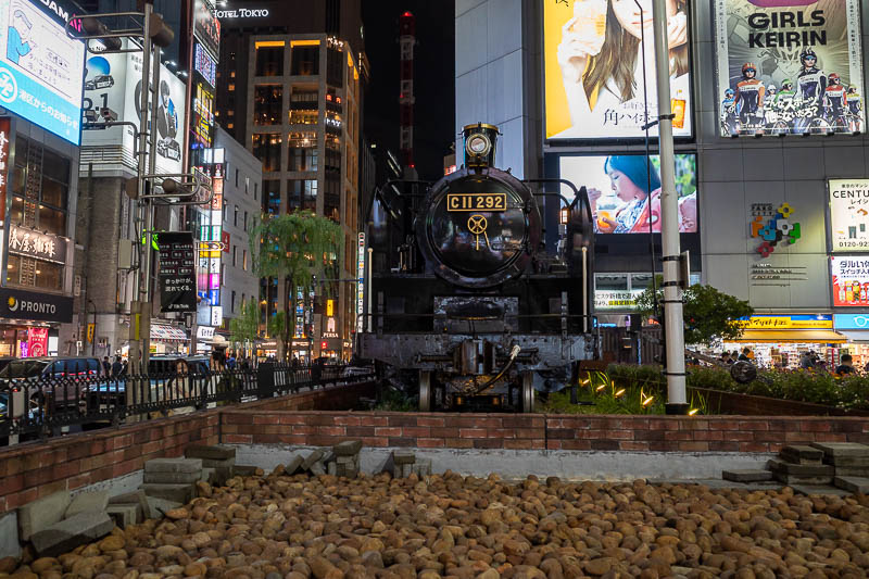 Japan-Tokyo-Shinagawa - Not many photos tonight, so here is a bonus pic back at Shimbashi where there is an old steam train parked in front of the station. There are a lot of