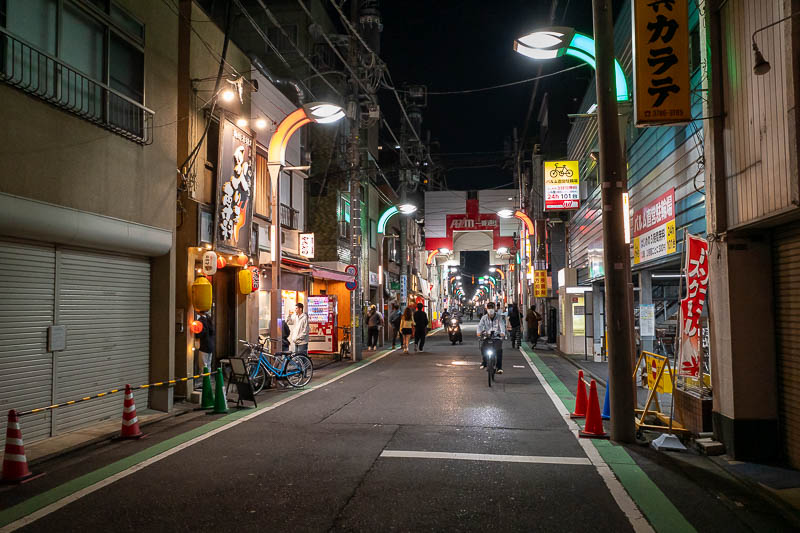 Japan-Tokyo-Musashi Koyama - After shrining for a while I decided to head back to the light, Italian flags (light poles) lead the way.