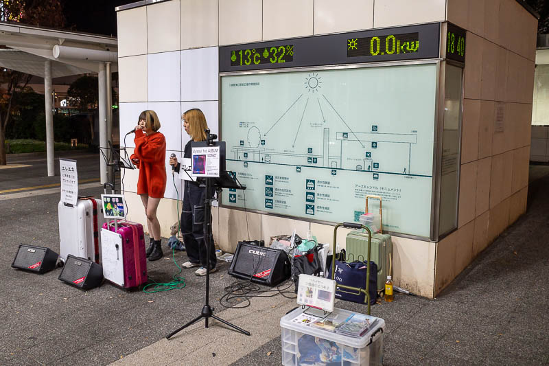 Japan-Tokyo-Kawasaki-Monjayaki - These buskers are named 13c32%, I have no evidence that they actually sing, but they do great detailed intros thanking their fans for commenting on th