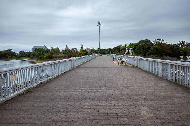 Japan-Tokyo-Museum-Dam - I had the entire dam to myself. That mystery pole in the distance is part of the amusement park, there is an observation ring thing that goes up and d