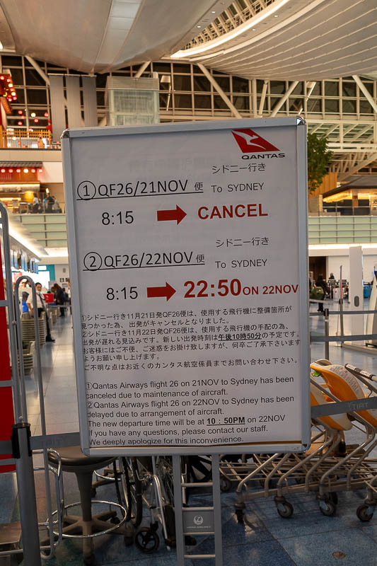 Back to Japan for the 11th time - October and November 2024 - Qantas is going well, cancelled and delayed flights. I am not flying Qantas. There were angry people hanging around the sign though.