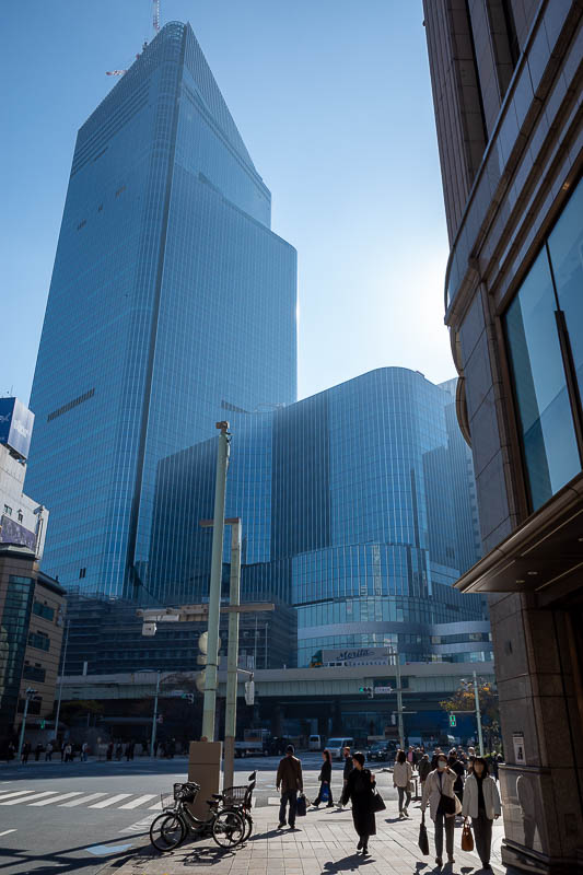 Japan-Tokyo-Ueno-Ginza - This huge new building is still under construction, but nearing completion, there are cranes on the top.