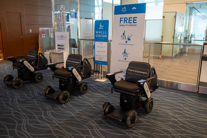 Japan-Haneda-Airport-Singapore - AI controlled wheelchairs of death just randomly swerve at people walking through the airport.