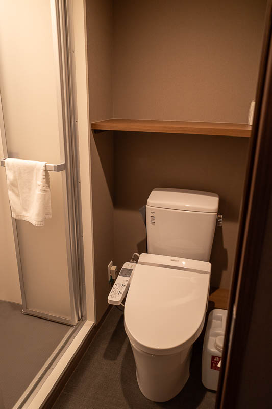 Japan-Tokyo-Kobe-Shinkansen - No bath here. Last room had a bath. I declare Ochanomizu Sotetsu Fresa hotel with it's 2 desks to be better than Kobe Dormy Inn.