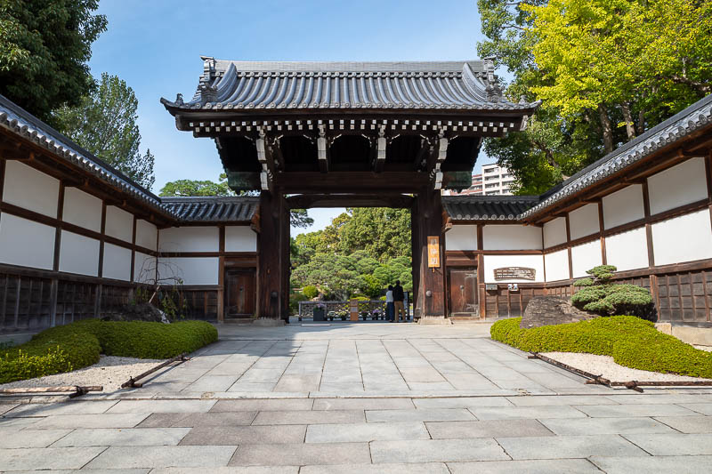 Japan-Kobe-Garden-Bridge - After descending through cobweb filled trails to find another way out of the park, here is the entrance gate to Sorakuen garden.