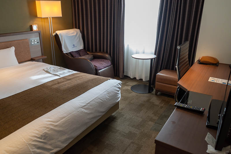 Japan-Kobe-Tokushima-Bus - Now for my room. Great desk and chair, full queen sized bed, bonus powered massage chair I won't use.