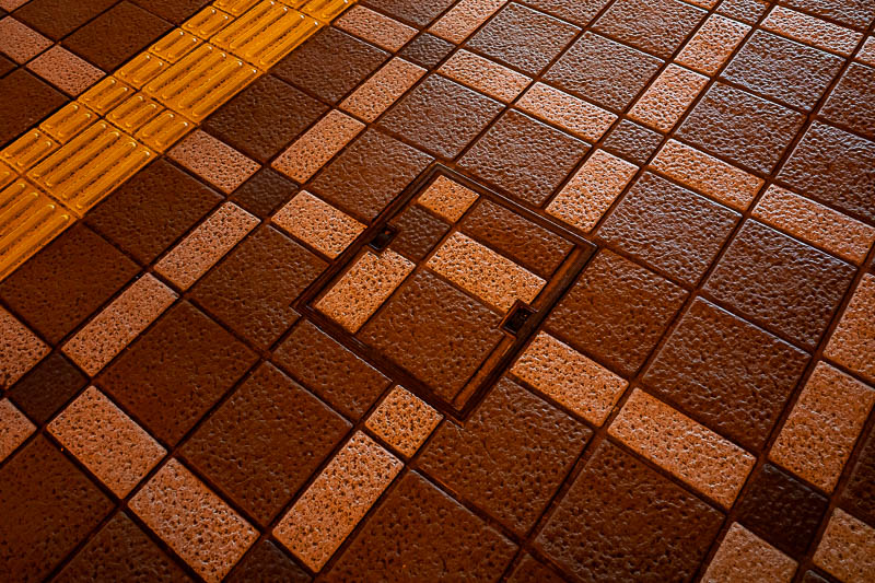 Japan-Tokushima-Ramen - Along this street, every single one of these covers (at least 20) had deliberately been put back the wrong way around. It was chaos!