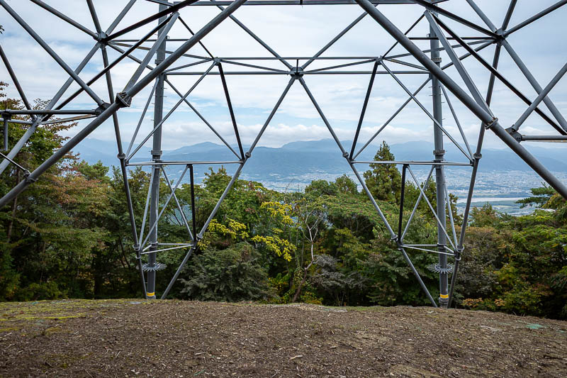 Trip 13 to Japan - October and November 2025 - You saw these giant power poles in an earlier pic. Now I am standing under one. Not a lot of spots for a clear view today.