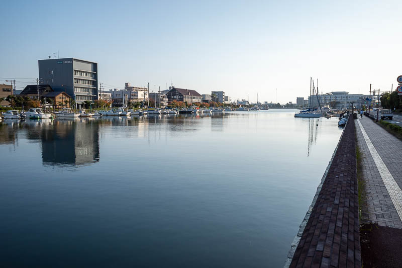 Japan-Tokushima-Takamatsu-Train - Before departing Tokushima, it was time for another lap, at dawn. Here is the river, with boats, none of them were moving though.