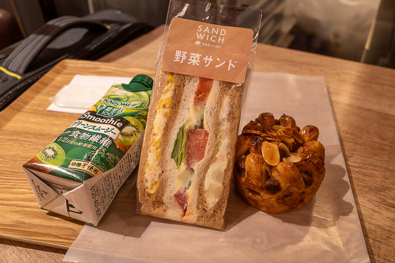 Japan-Tokushima-Takamatsu-Train - Here is my lunch, because I was too early to check in. The fruit and vegetable smoothie drink is a favourite I discovered on a recent trip to Korea, i