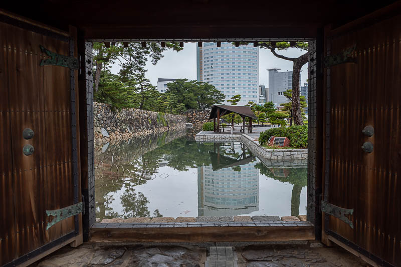 Trip 13 to Japan - October and November 2025 - Gate with a view. The moat is interesting, it is sea water, there are not many castles in Japan with a sea water moat.
