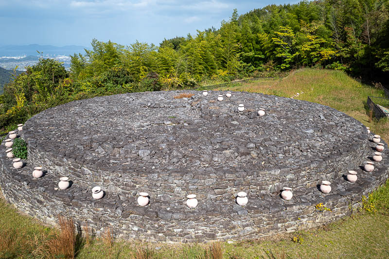 Japan-Takamatsu-Hiking-Kotohira - Except... this is an ancient tomb. I have never seen anything like it before. The sign showed ancient half naked Japanese people dressed like Egyptian