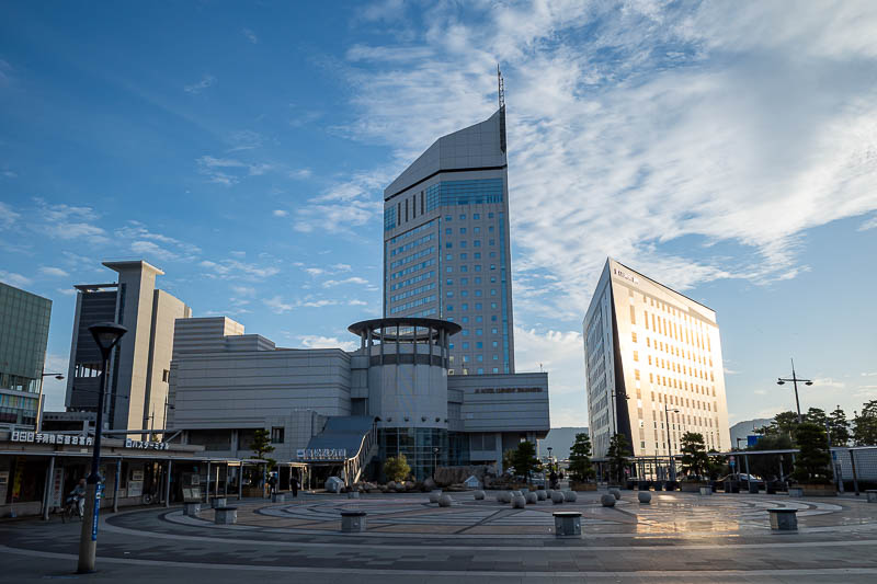 Japan-Takamatsu-Hiking-Mount Inazumi - Here is Takamatsu station near dawn. Great weather, great light, great clouds. Today was a cash only train ride, 1200 yen (about $12) in each directio