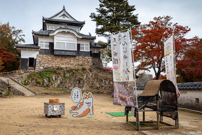 Japan-Okayama-Castle-Hiking - As I was buying my ticket I was looking over my shoulder at the famous cat, Sanjuro, who was sitting here on his throne, when his guard picked him up 