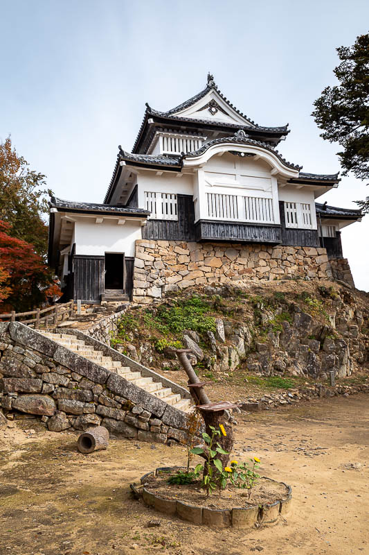 Japan-Okayama-Castle-Hiking - There is what may be the castle but may not be the old bit, with more cat furniture in the foreground.