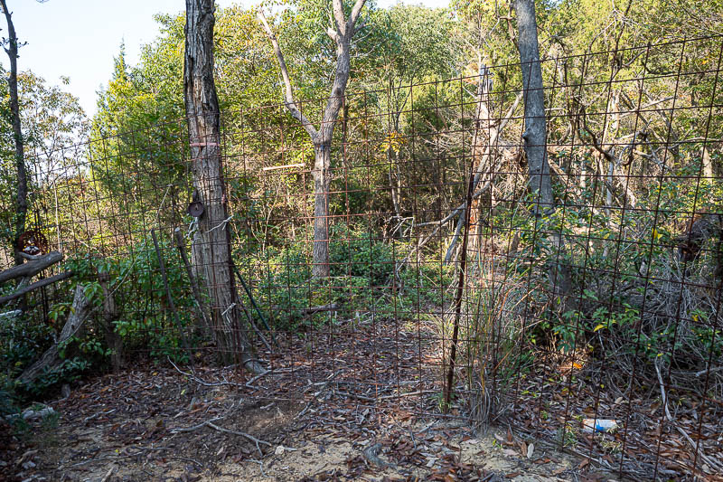 Trip 13 to Japan - October and November 2025 - A few hundred metres in is this fence. I guess it is to keep wild pigs out. You can untie the cables and let yourself through. I double checked my map