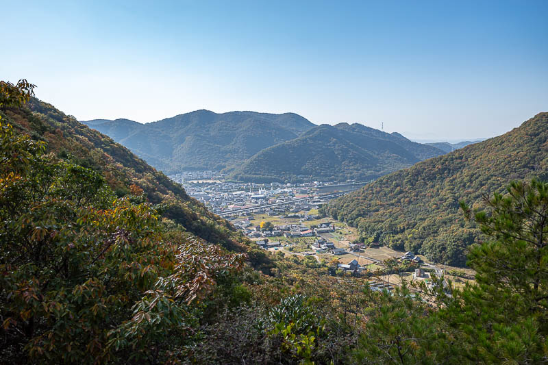 Trip 13 to Japan - October and November 2025 - So many great views today, I really like when the mountains come up out of the flat farm land. The Shinkansen track can be seen here.