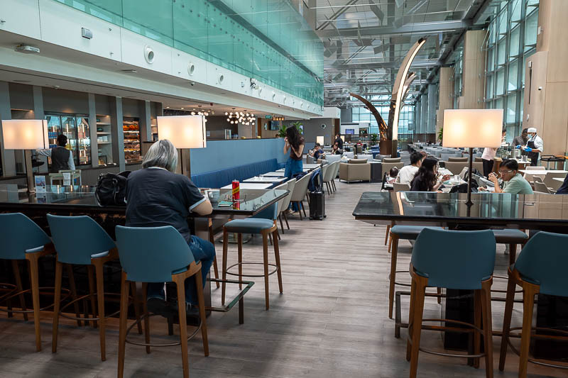 Singapore-Airport - And finally, the view from where I am seated drinking about 2L of water out of tiny bottles. I think my flight to Tokyo Haneda is delayed 20 minutes,