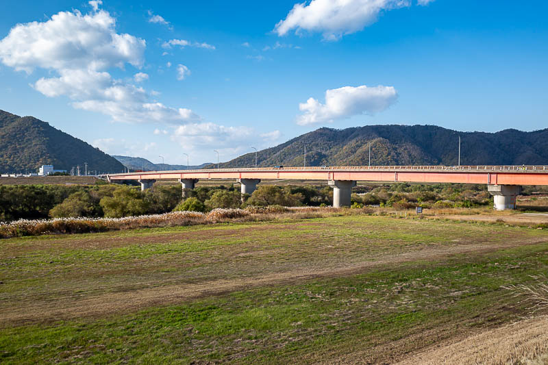 Trip 13 to Japan - October and November 2025 - I was about 25 minutes too early for the train, so I had time for some view shots from the valley floor. Here is the red bridge you can see in earlier