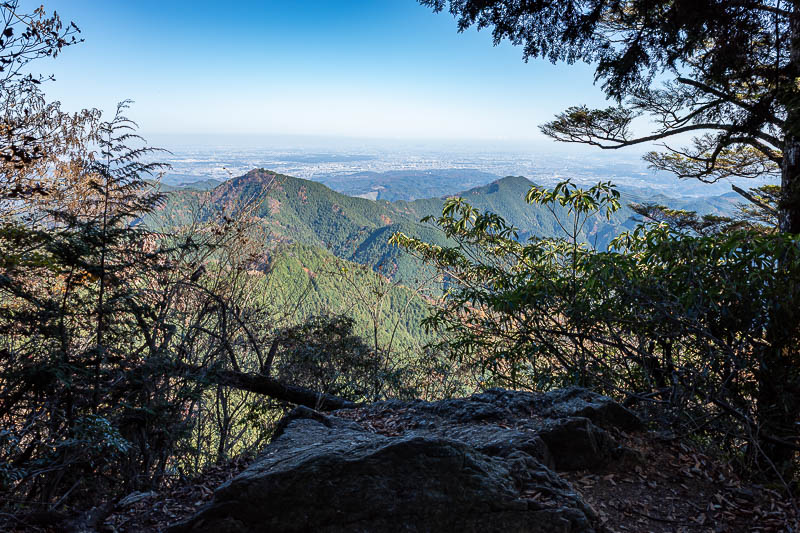Japan-Tokyo-Hiking-Mount Odake - Another nice view of Tokyo, with a foreground rock.