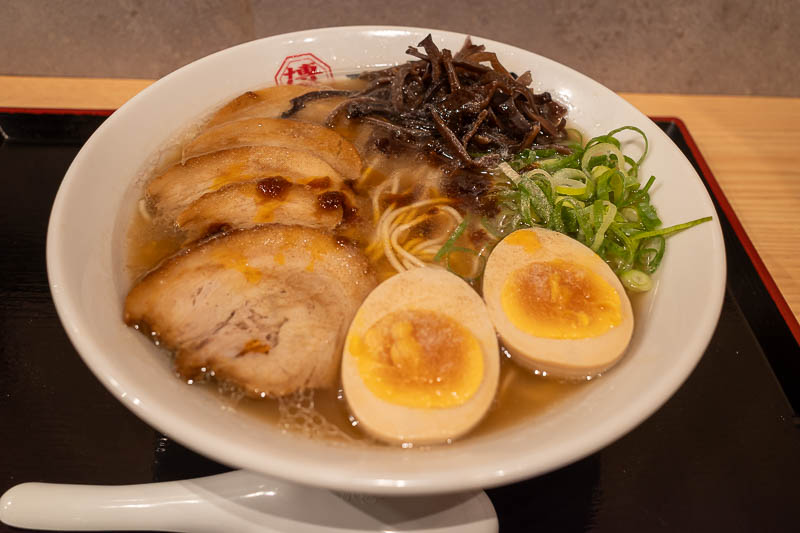 Japan-Tokyo-Kanda-Ramen - And so I ate in one of them, and had ramen again. Not as good as last night but not bad. Lighter flavour. 1200 yen, do your own conversion. This helps