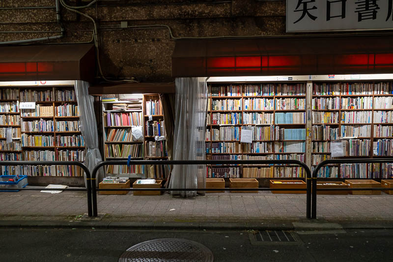 Japan-Tokyo-Lidabashi-Suidobashi - The whole area around my hotel is book shops. Many street stalls that cover their books in plastic sheeting and many stores that just pull a curtain a