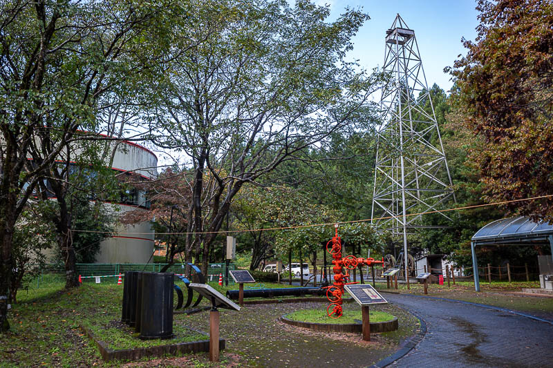 Japan-Niigata-Hiking-Bodaijiyama - Actually that's the education centre on the left, and some token gesture oil well equipment on the right.