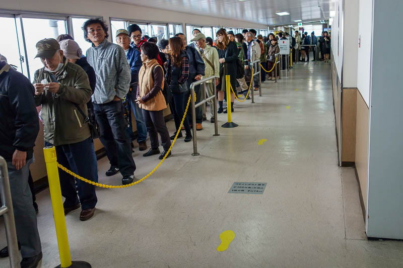 Japan 2015 - Tokyo - Nagoya - Hiroshima - Shimonoseki - Fukuoka - These people were stuck in this line for hours. Japanese politeness was out the window. I walked past laughing at them.